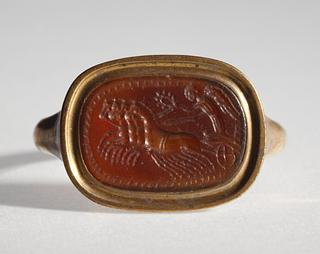 I578 Nike in a chariot drawn by four horses