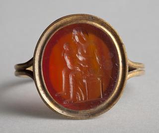 I164 Seated woman with a child