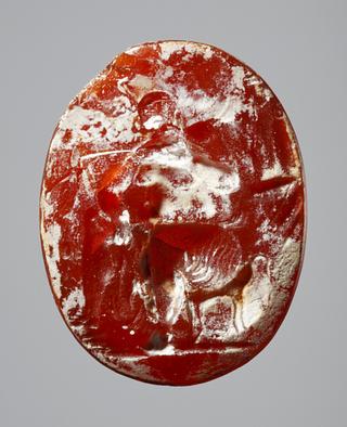 I358 Silenus seated with wine-skin and drinking bowl