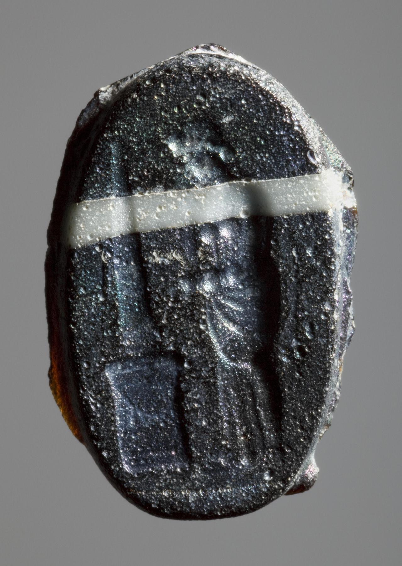 Kvinde ved en gravstele, I931