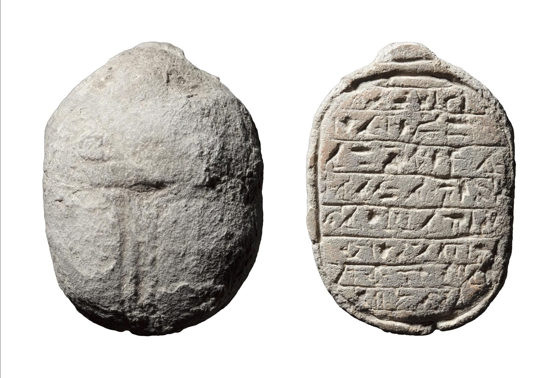 Skarabæ med hieroglyf-indskrift, H401