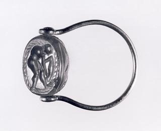 I38 Mand med et aflangt objekt