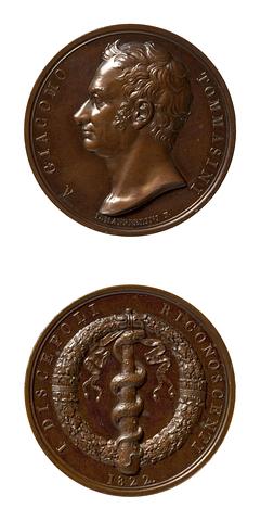 F100 Medaljens forside: Giacomo Tommasini. Medaljens bagside: Æskulaps stav og en egekrans
