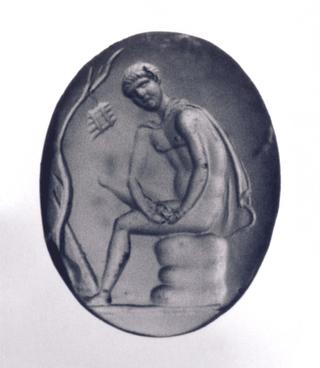 I1165 Seated man extracting a thorn from his foot