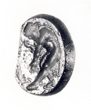 I81 Mand ved et træ med en slange