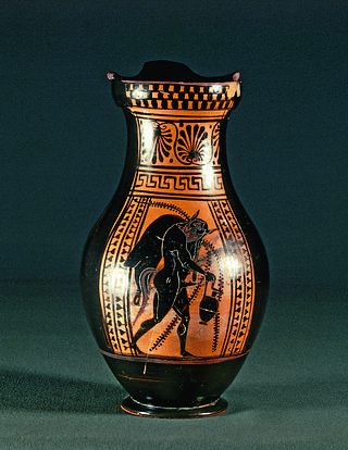 H526 Olpe with a silenus carrying a jug and a wineskin