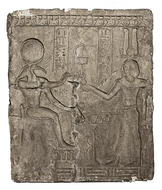 L223 Antinous receives a wadjet from Amon
