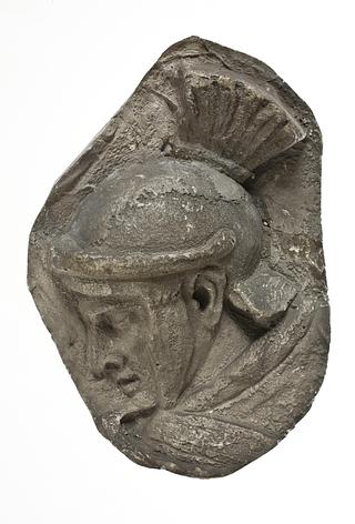 L326dd Head of a helmeted legionary