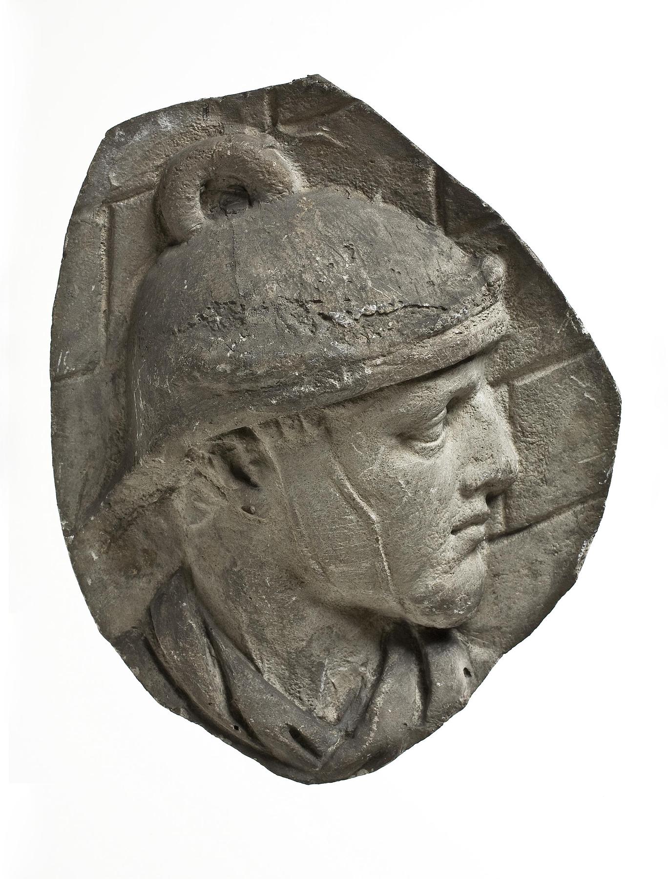 Head of a helmeted legionary, L326m
