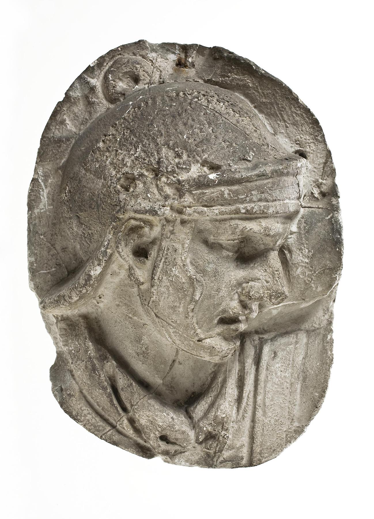 Head of a helmeted legionary, L326e
