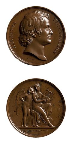 F10 Medaljens forside: Portræt af Thorvaldsen. Medaljens bagside: Amor og Erato
