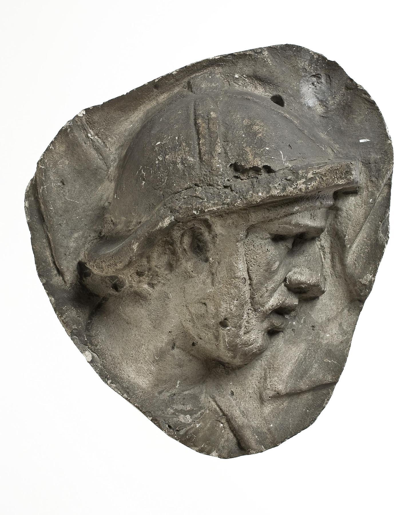 Head of a helmeted Roman horseman, L326k