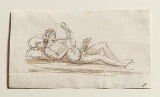 C903 Reclining male figure playing the guitar