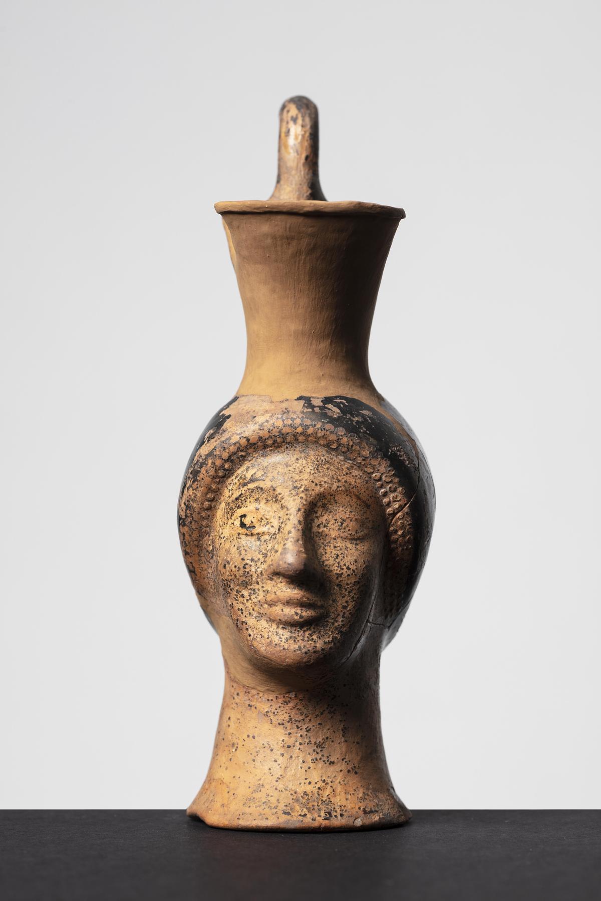 Oinochoe i form af et kvindehoved, H653