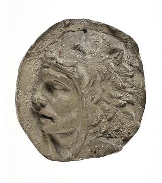 L327p Head of a Roman standard-bearer