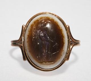 I689 Winged goddess with a rudder and cornucopia