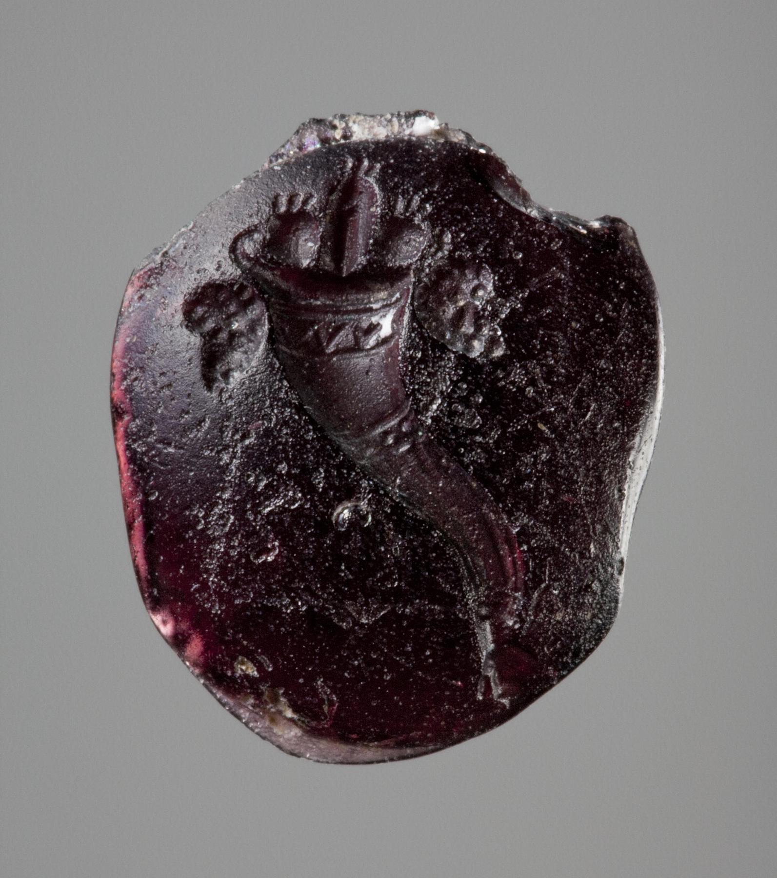 Overflødighedshorn med æselhoved (?), I171