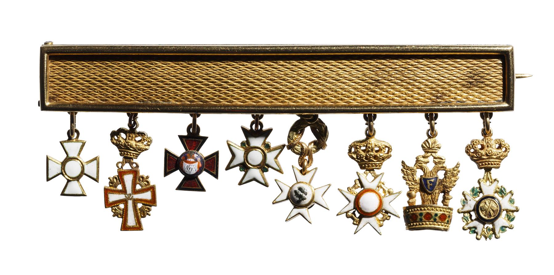 Gold display with eight miniature orders, N28