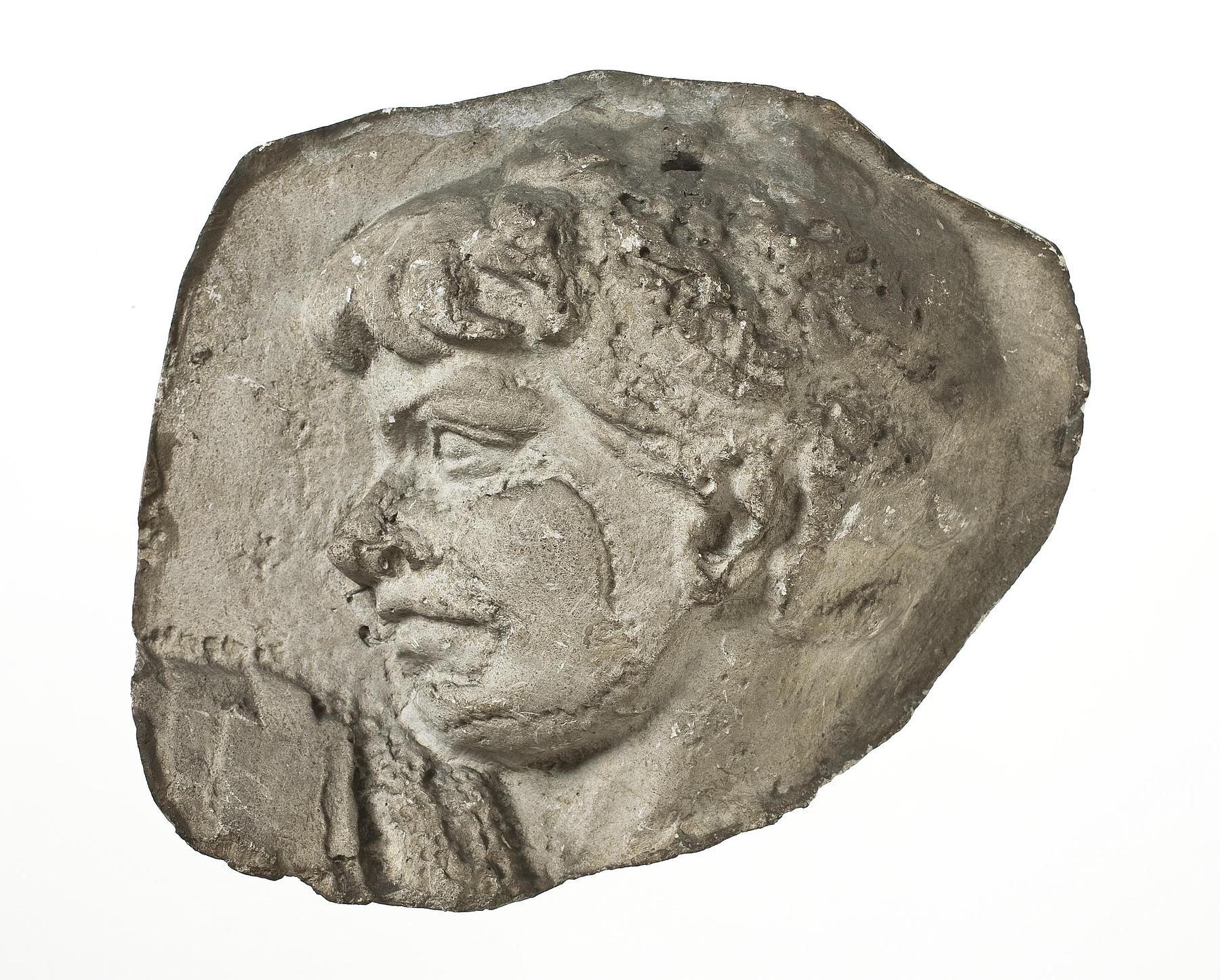 Heads of Dacians, L330y