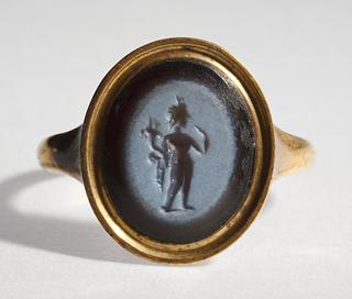 I669 Harpocrates holding a cornucopia