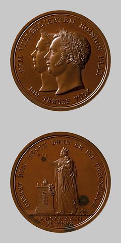 F117 Medal obverse: King Wilhelm I and Queen Pauline of Württemberg. Medal reverse: Württemberg thanks Heaven for the new heir to the throne by the homeland altar