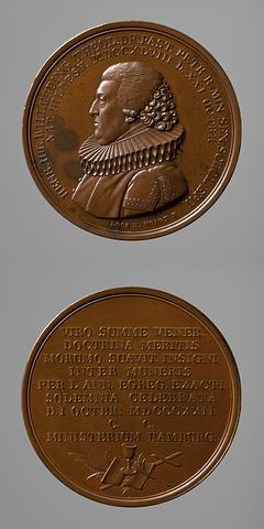F115 Medaljens forside: Pastor Heinrich Julius Willerding. Medaljens bagside: Kristendommens insignier