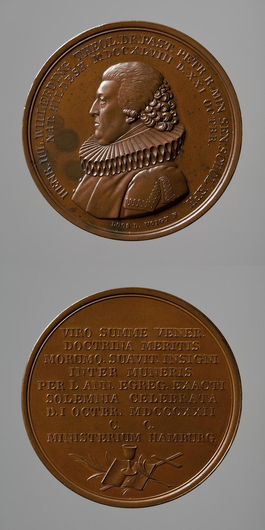 Medaljens forside: Pastor Heinrich Julius Willerding. Medaljens bagside: Kristendommens insignier, F115