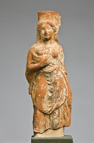 H1031 Statuette af en kvinde med en gris