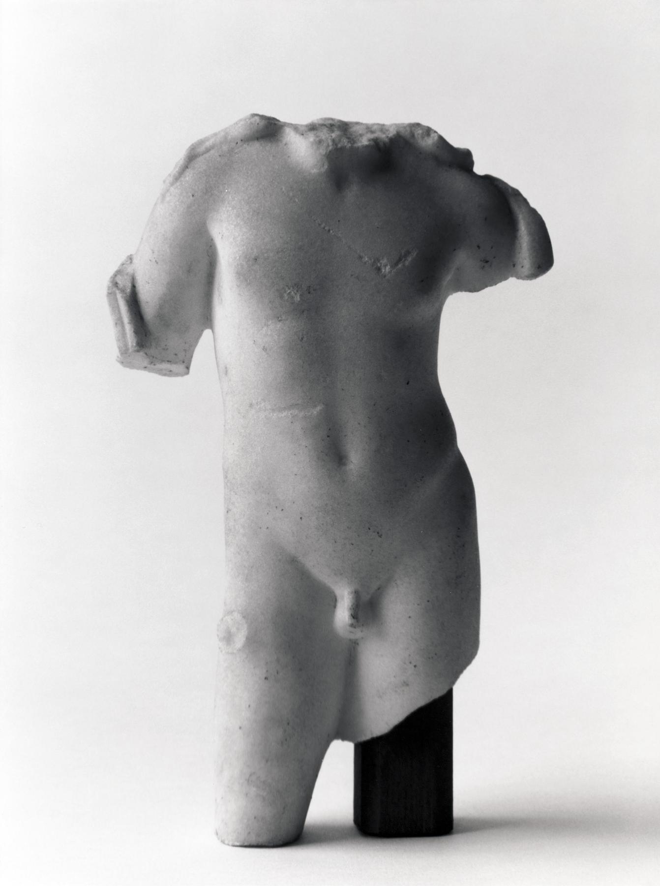 Statuette of a young god, H1410