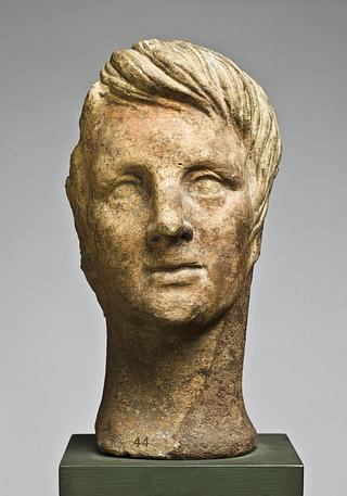 H1044 Votive head of youth