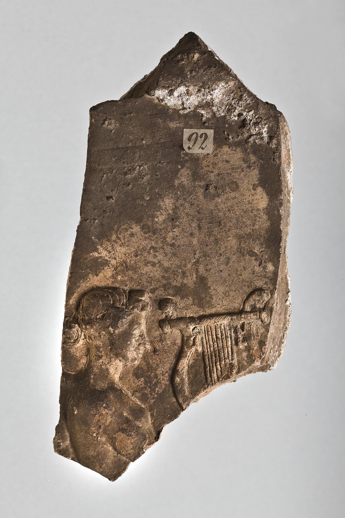 Campanarelief med bevinget yngling, der holder en cithara, H1092