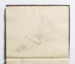 D1589,67 Seated youth in Roman Soldier Costume
