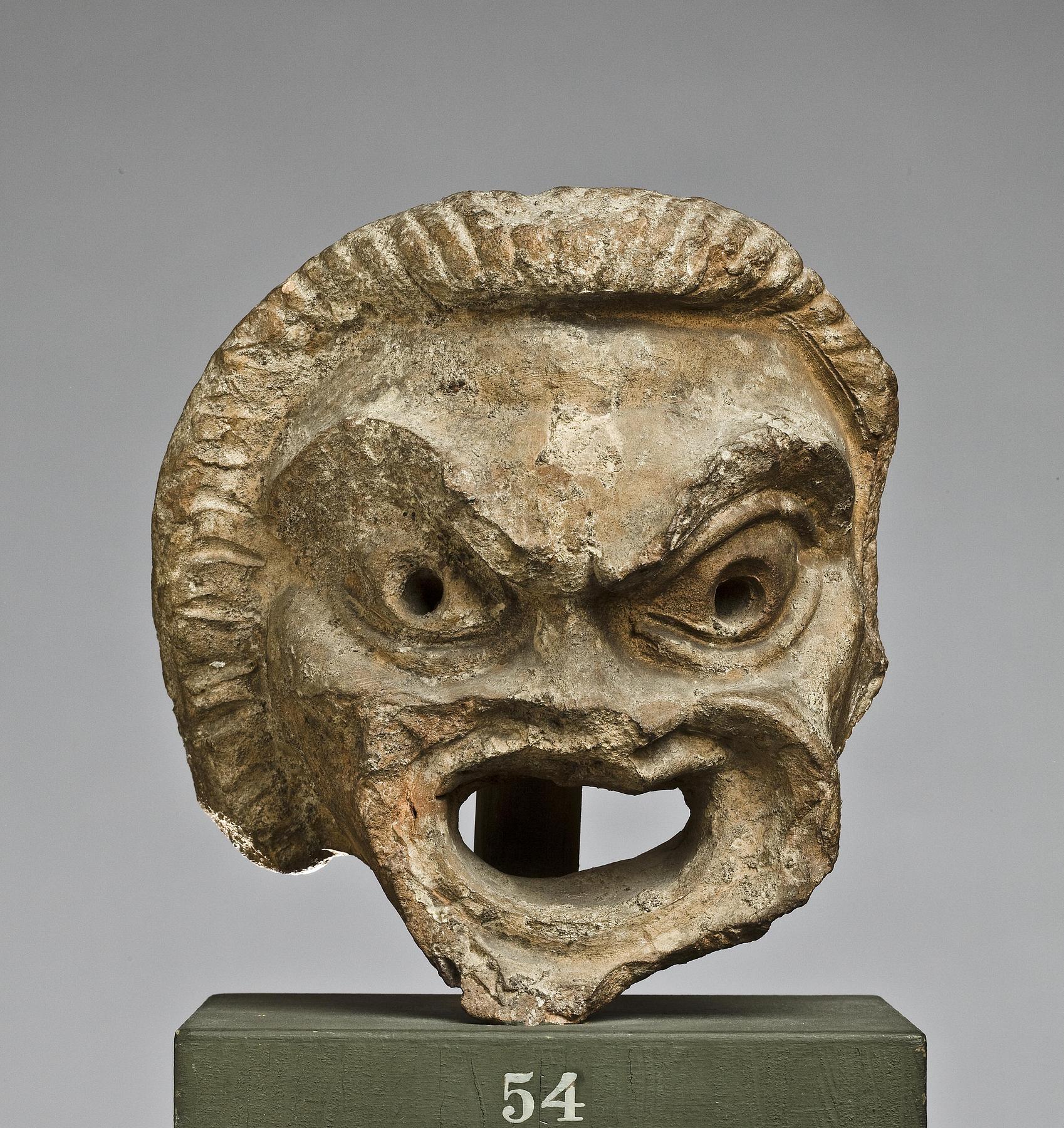 Water spout in the shape of a theatre mask, H1054