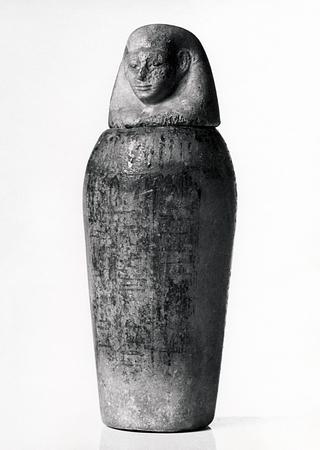 H391 Kanopekrukke med menneskehovedlåg, hieroglyf-indskrift samt påmalet halsfrise og Osirisfigur