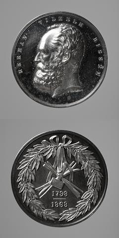 F146 Medal obverse: H.W. Bissen. Medal reverse: Laurel wreath and sculptors' tools