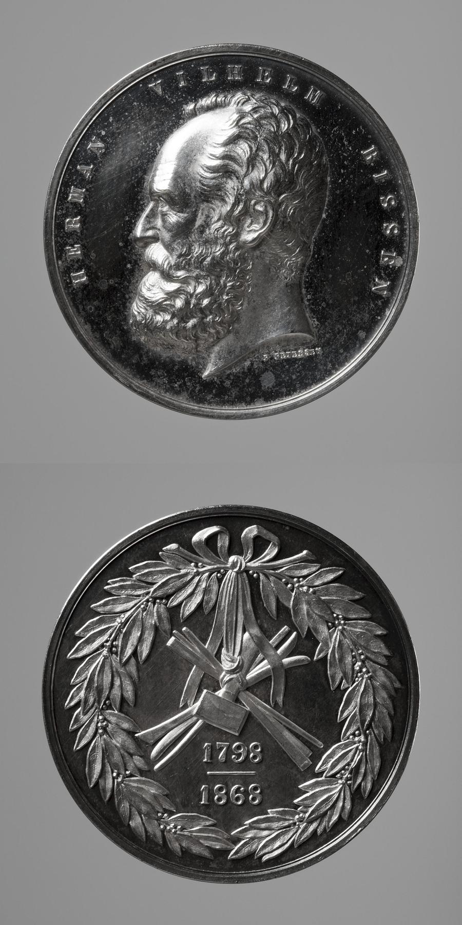 Medaljens forside: H.W. Bissen. Medaljens bagside: Laurbærkrans og billedhuggerredskaber, F146