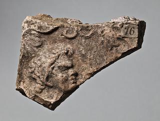 H1076 Campana relief with a satyr's head and vines