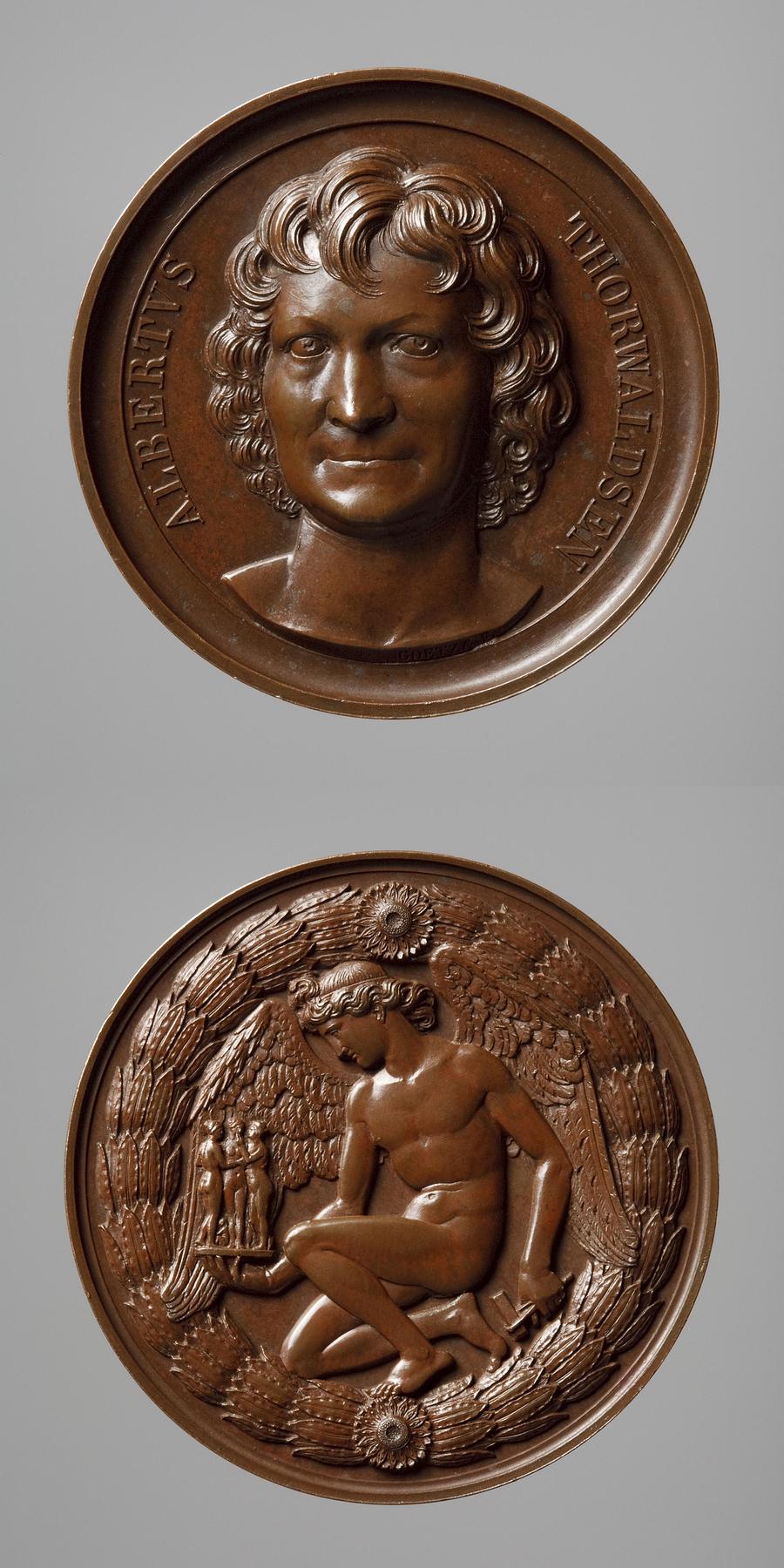 Medal obverse: Portrait of Thorvaldsen. Medal reverse: The Genius of Sculpture kneeling, holding hands with The Graces and Cupid, F4