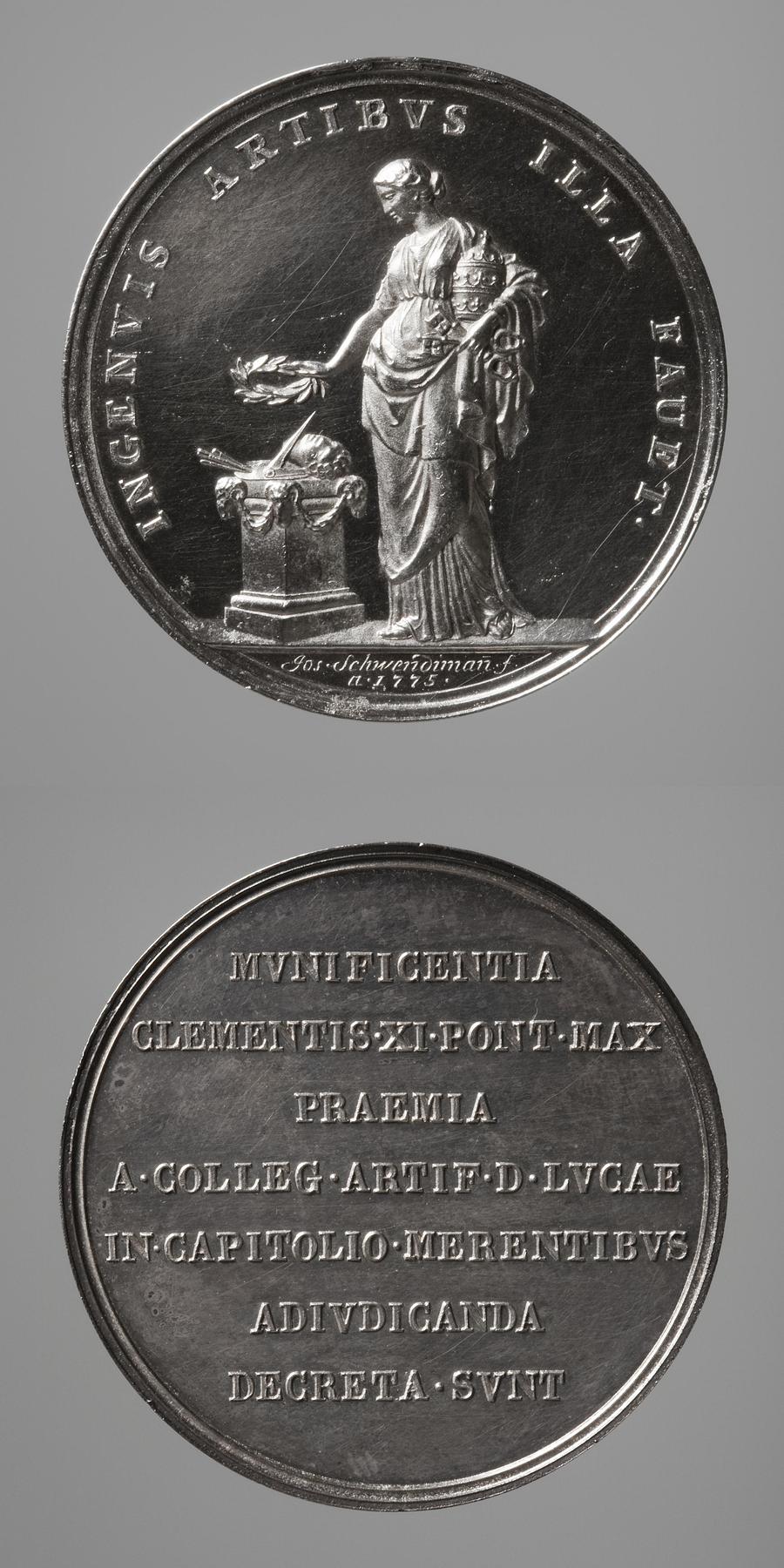 Medaljens forside: Pavemagten rækker en laurbærkrans over et alter med kunstarternes attributter. Medaljens bagside: Inskription, F30
