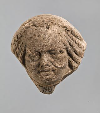 H1086 Campana relief with male mask