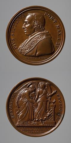 F36 Medaljens forside: Pius 7. Medaljens bagside: Englen fører Peter ud af fængslet