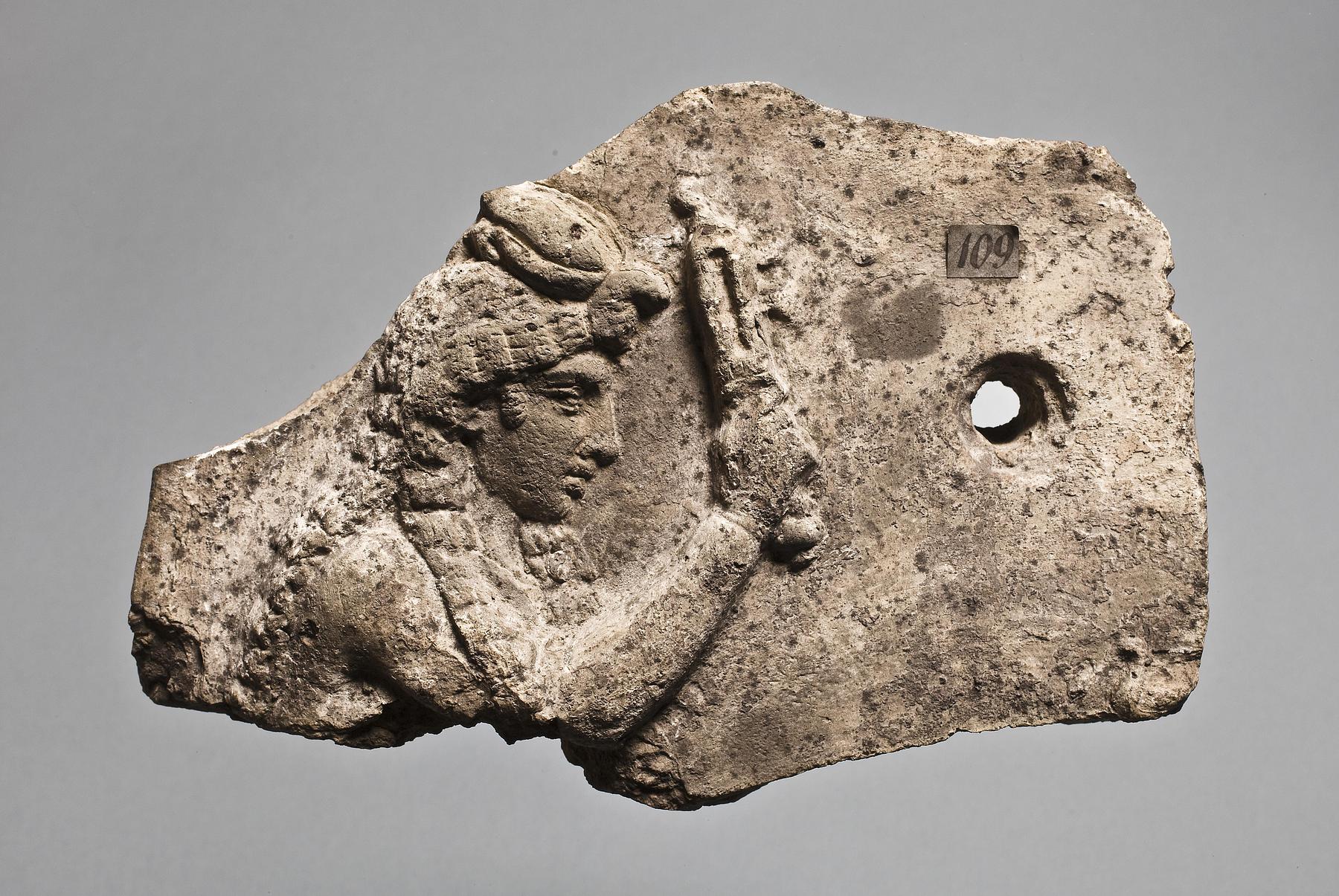 Campana relief with woman with sistrum and griffin crown, H1109