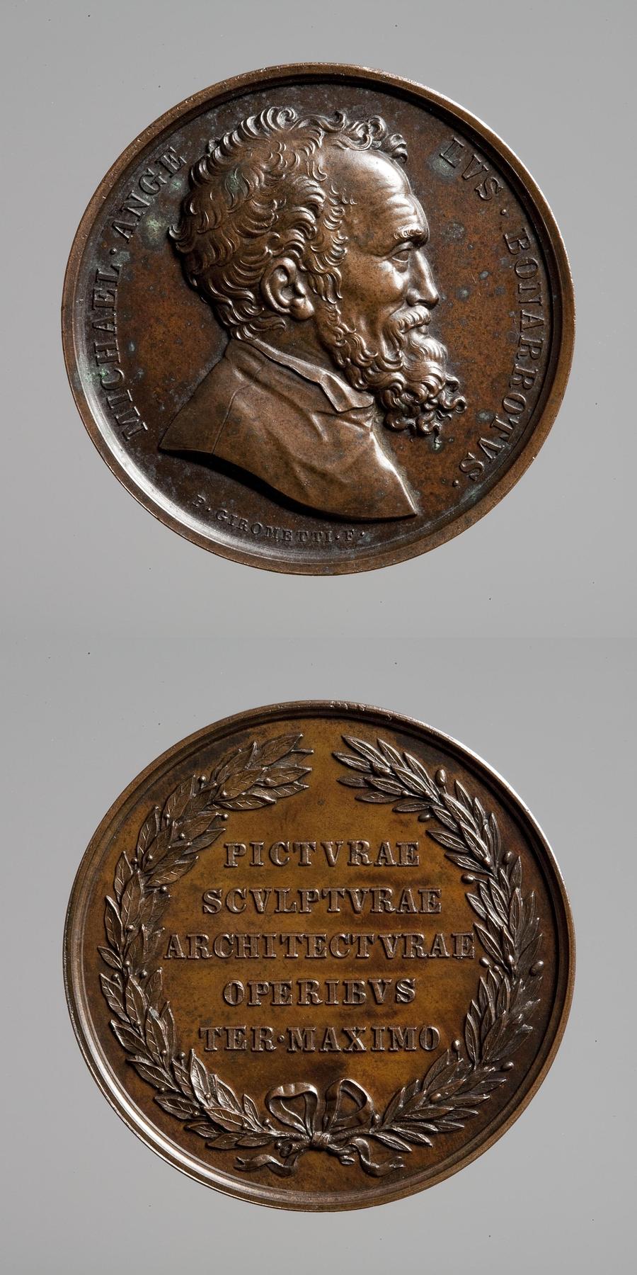 Medaljens forside: Michelangelo. Medaljens bagside: Inskription, krans af olivengren og laurbærgren, F84