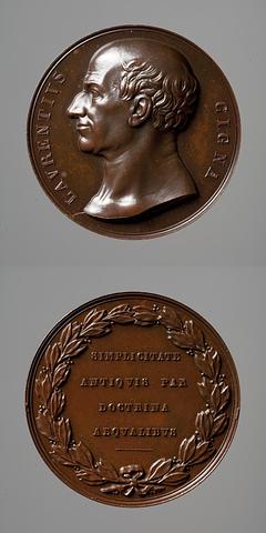 F67 Medaljens forside: Larentius Cigna. Medaljens bagside: Laurbærkrans og inskription