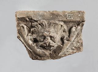 H1130 Campana relief with lion's head above an acanthus ornament
