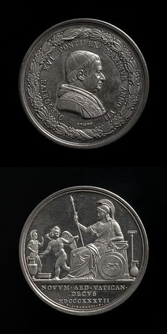 F82 Medaljens forside: Pave Gregor 16. Medaljens bagside: En vinget genius viser Roma de etruskiske antikker