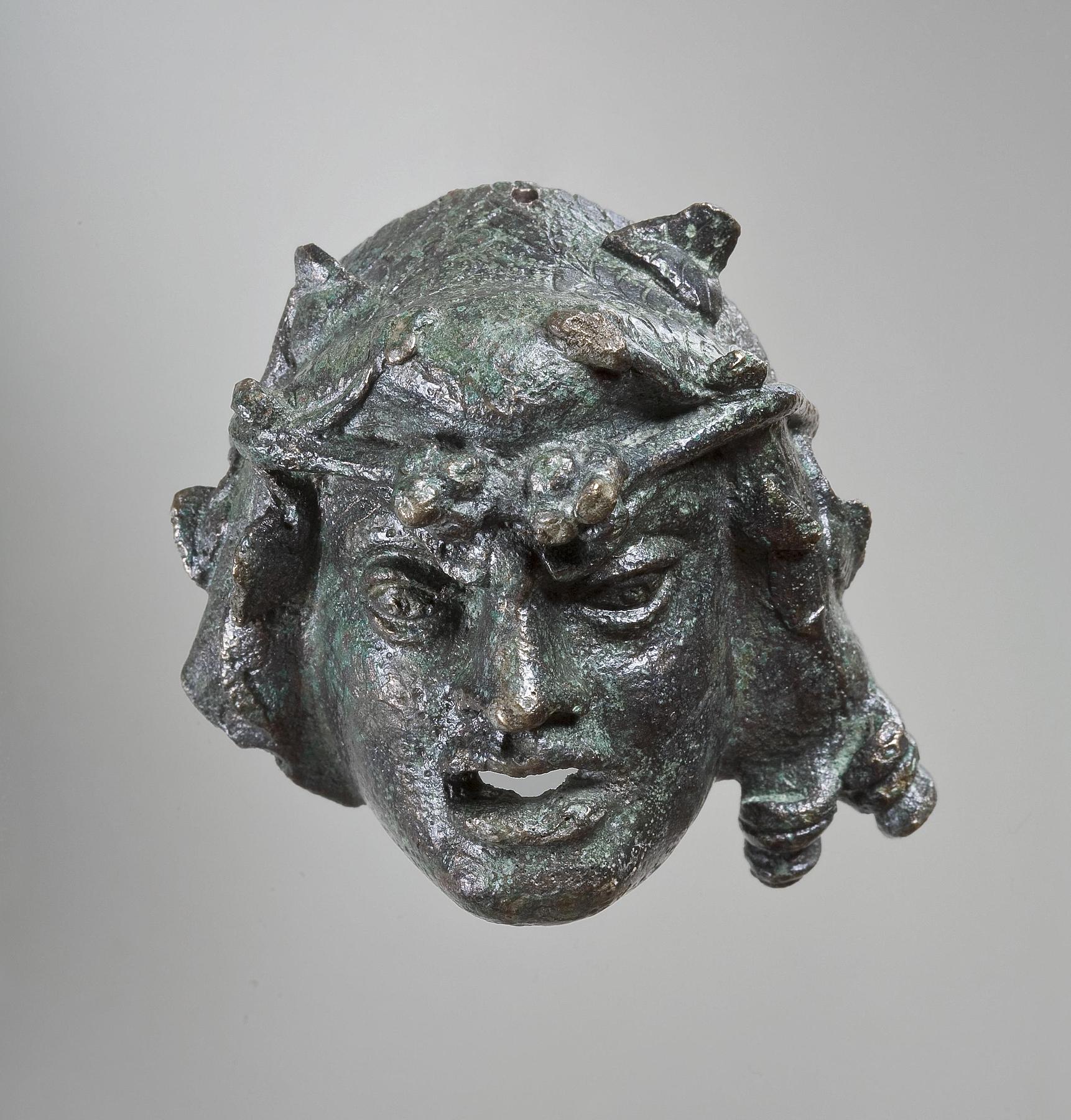 Mounting in the shape of a bacchante mask, H2092