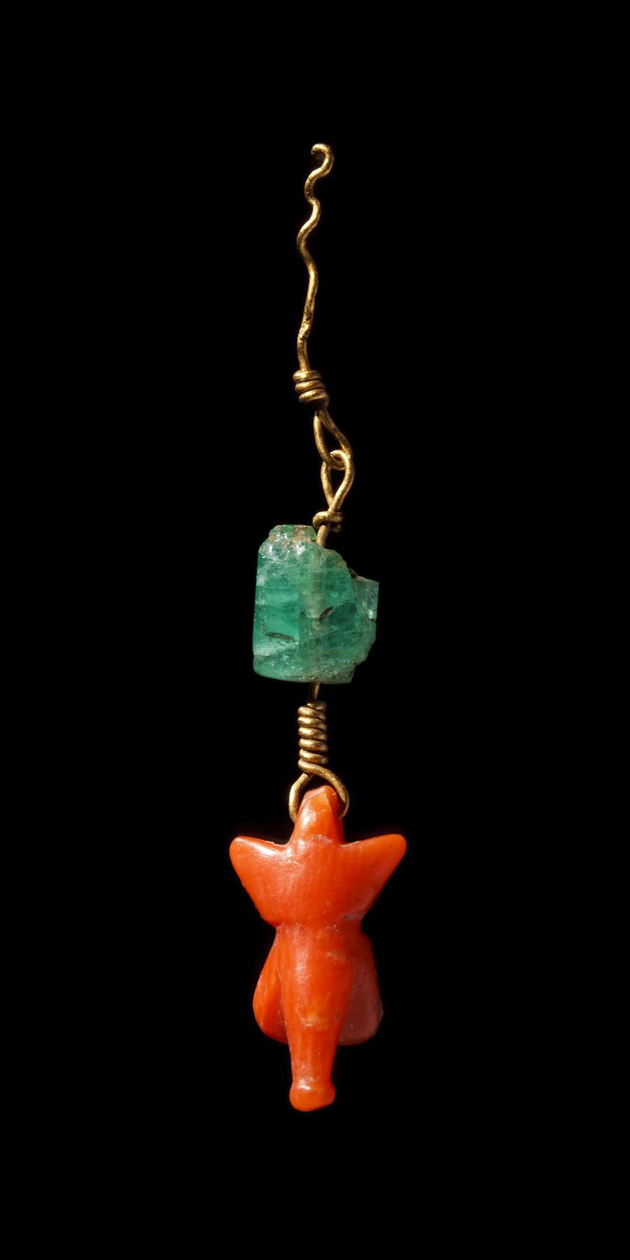 Ear ring (?) with pendant in the shape of male genitalia, H1863