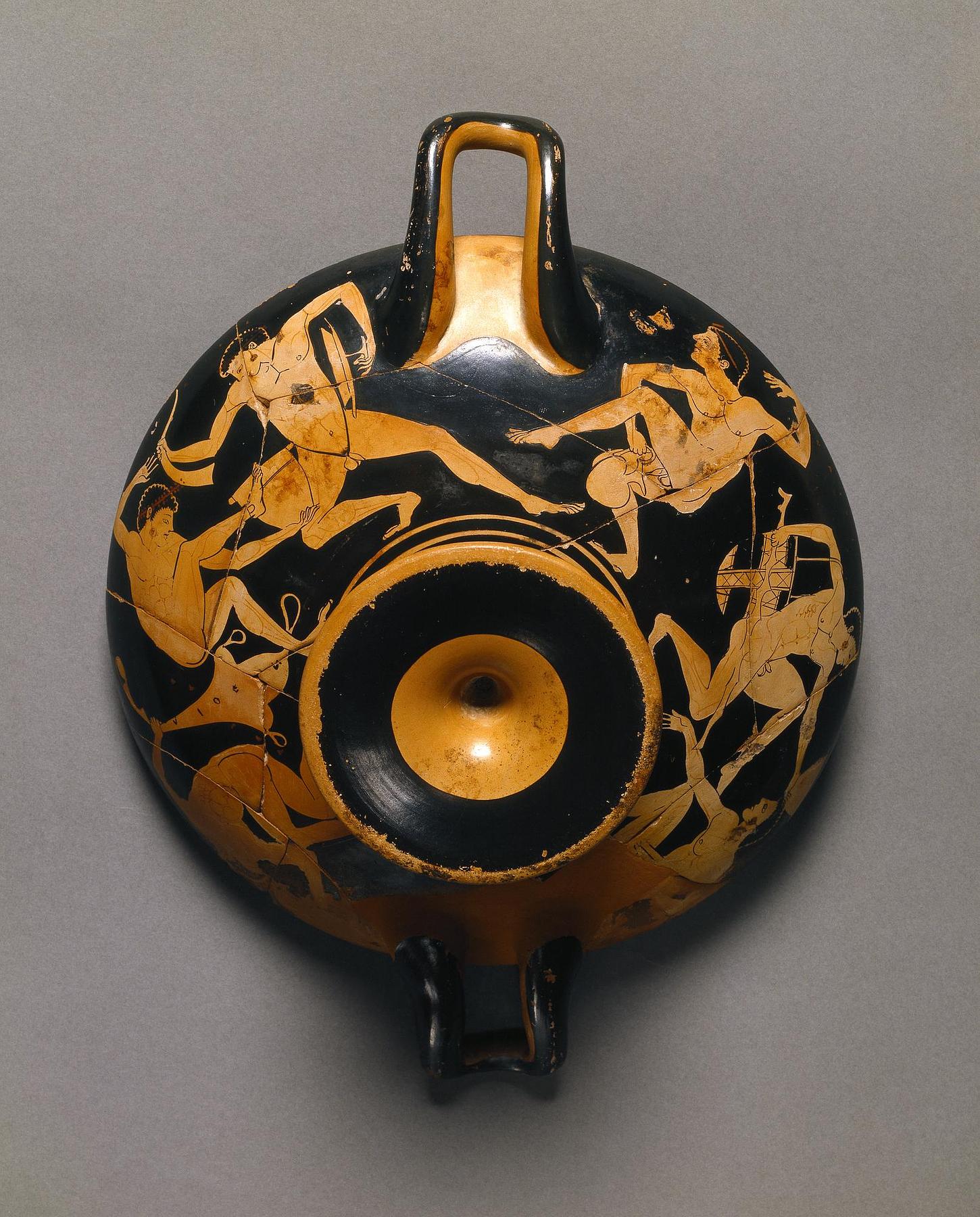 Kylix with drunken youths (A, B) and a woman by a laver (tondo), H615