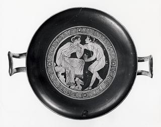 H640 Kylix with women and youths playing tambourine (A, B) and a satyr and a seated woman (tondo)